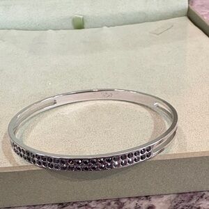 Elegant Silver Bangle Bracelet with Black Stones